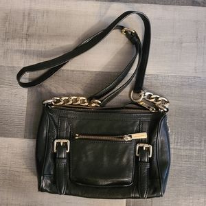 Black Michael Kors cross body purse.